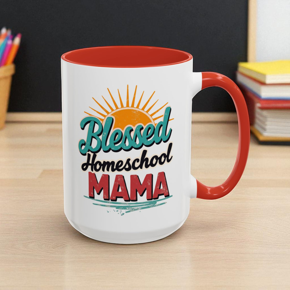 White mug with red interior and handle, featuring 'Blessed Homeschool Mama' text on a wooden surface.