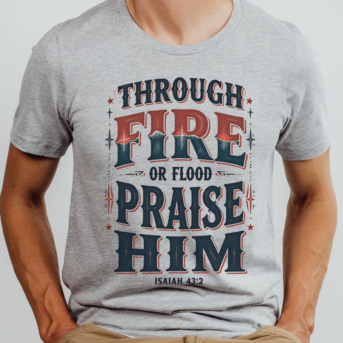 Gray t-shirt with motivational text design on a plain background