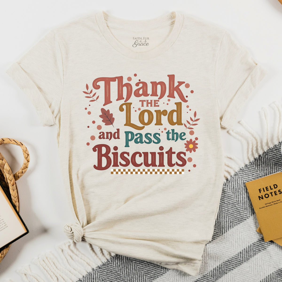Beige t-shirt with 'Thank the Lord and Pass the Biscuits' text on a white background