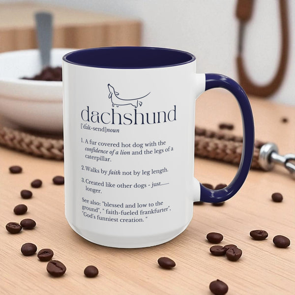Mug with dachshund definition on a table with coffee beans
