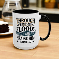 White mug with black interior and handle, featuring a motivational quote on a wooden table.