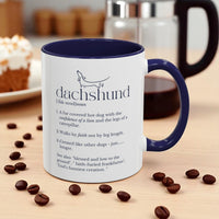 Mug with dachshund definition on a table with coffee beans