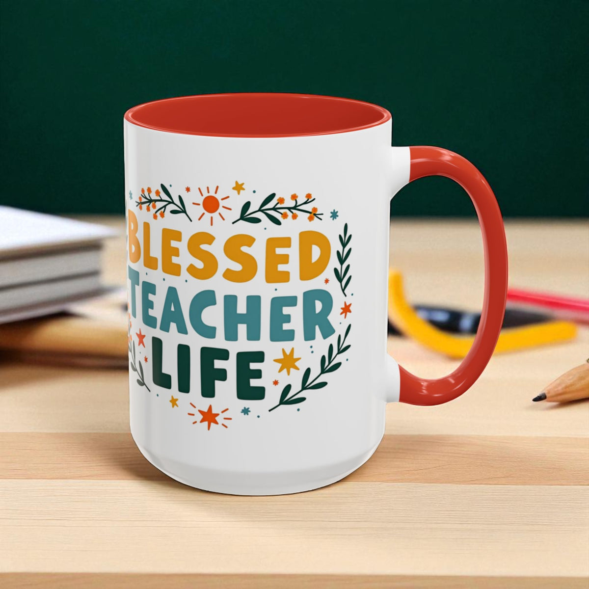 Mug with 'Blessed Teacher Life' text on a desk with school supplies.