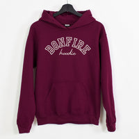 Maroon hoodie with 'Bonfire hoodie' text on a white background