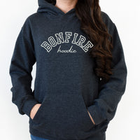 Dark grey hoodie with 'Bonfire hoodie' text on a white background