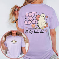 Person wearing a purple t-shirt with a ghost graphic and text, on a plain background.