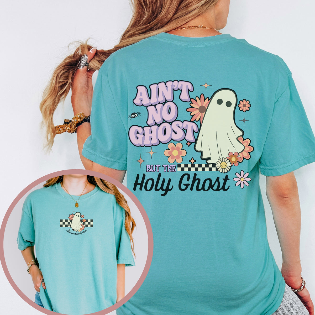 Teal t-shirt with ghost graphic and text on a white background