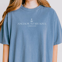 Blue t-shirt with 'Anchor to My Soul' text and anchor graphic on a plain background