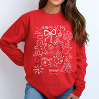 Red long sleeve shirt with white Christmas-themed graphics and 'season of joy' text on a plain background