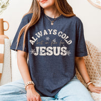 Person wearing a navy blue t-shirt with 'Always Cold but on fire for Jesus' text.