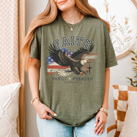 Person wearing a green t-shirt with an eagle graphic and text in a home setting