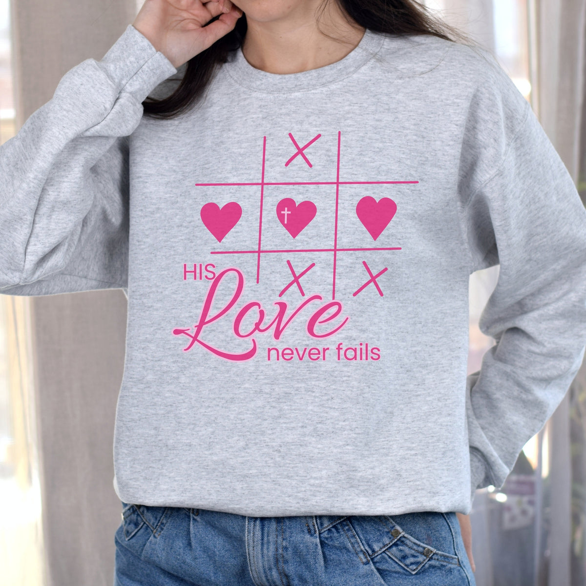 HIS LOVE NEVER FAILS TIC TAC TOE SWEATSHIRT