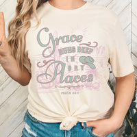 Person wearing a t-shirt with 'Grace Runs Deep in Dry Places' text and Psalm 63:1 quote.