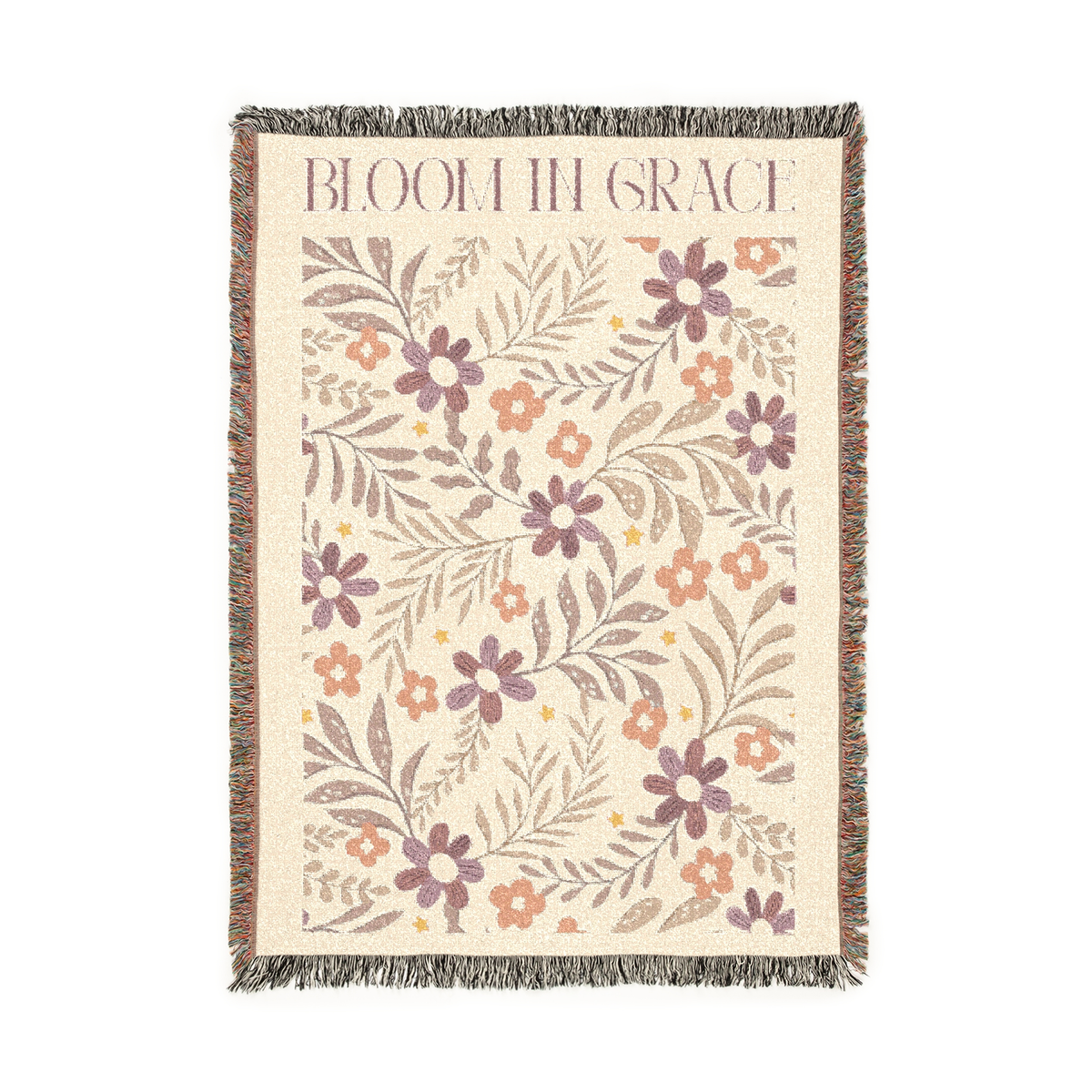 Floral patterned throw blanket with 'Bloom in Grace' text on a white background