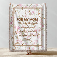 Floral patterned blanket with text for mom on a light background