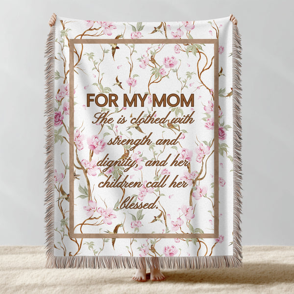 Floral patterned blanket with text for mom on a light background